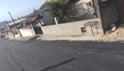 Terreno com casa de madeira